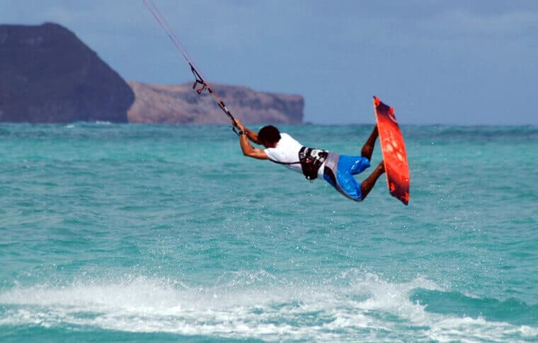 Kiteboarding Lessons: Taking kiteboarding lessons on the open water.